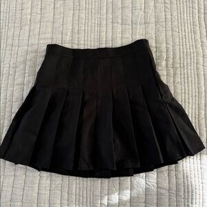 Pleated black mini skirt
